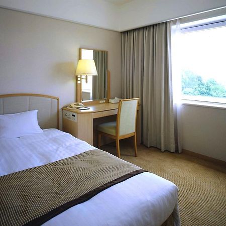 Hotel Hankyu Expo Park Osaka Suita Bagian luar foto