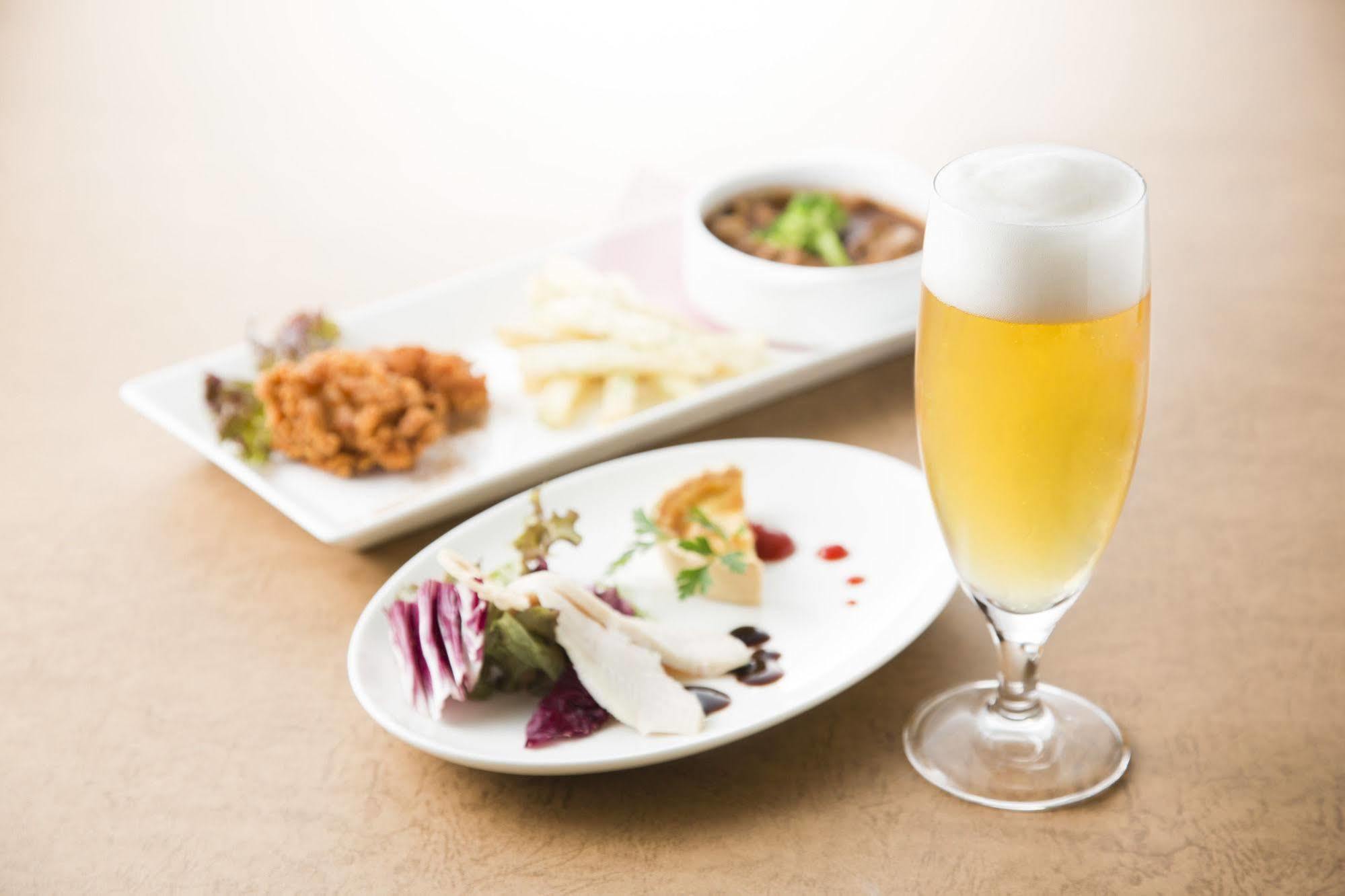 Hotel Hankyu Expo Park Osaka Suita Bagian luar foto